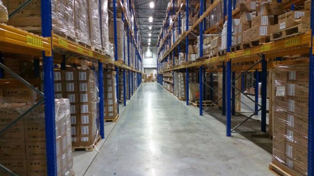 Warehouse aisle stacked with boxes